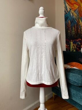 White ribbed knit turtleneck sweater